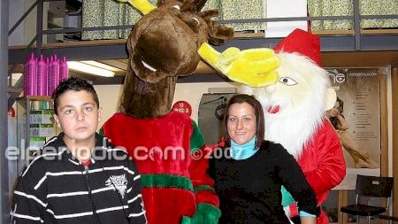 Visita de Papa Noel a los comercios del Puerto