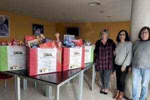 Giving4Giving dona dulces y 1.000 € al Programa de Alimentos de La Nucía