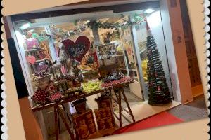 La Asociación de Empresarios y Autónomos de Buñol y comarca premia al cliente fiel con monedas Combu para canjear en los comercios