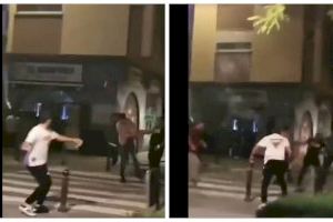 Macrobaralla amb pals, martells i botelles en la plaça Hondures de València Macrobaralla amb pals, martells i botelles en la plaça Hondures de València