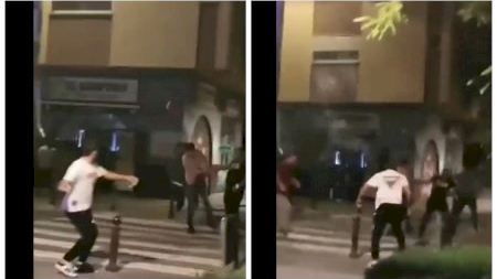 Macropelea con palos, martillos y botellas en la plaza Honduras de Valencia