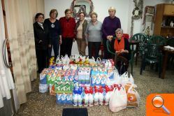 Las Amas de Casa Tyrius concluyeron la recogida de leche y aceite para destinarlo a la Asociación Valenciana de la Caridad